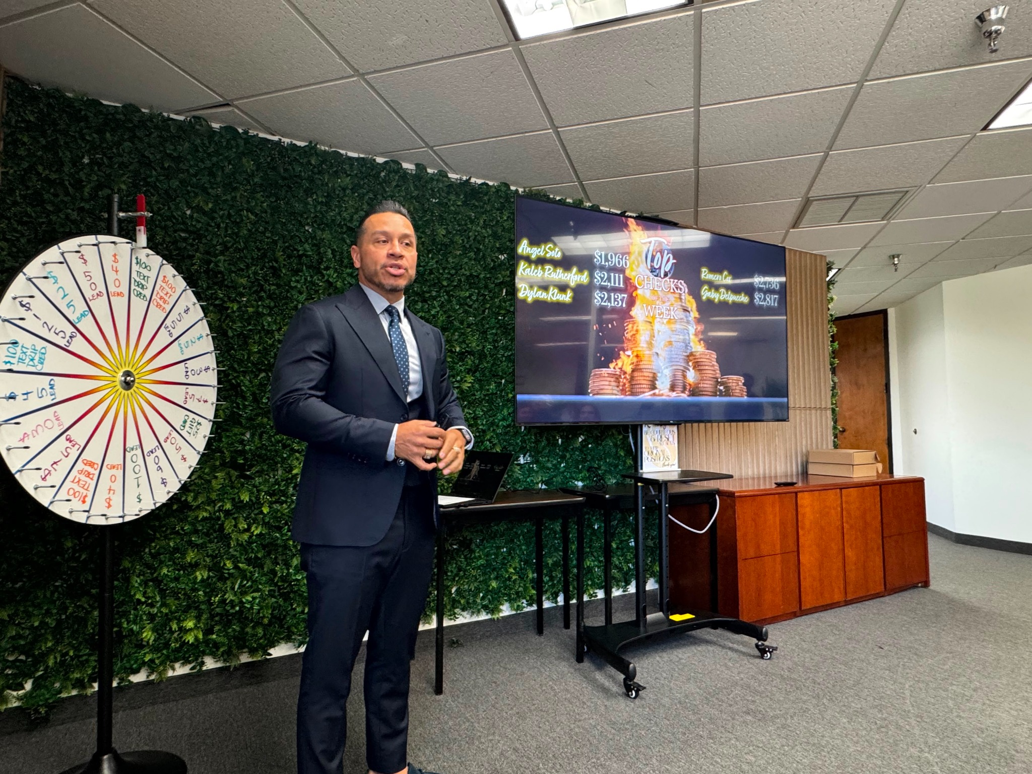 Mario Garay leading a Team Monarch meeting